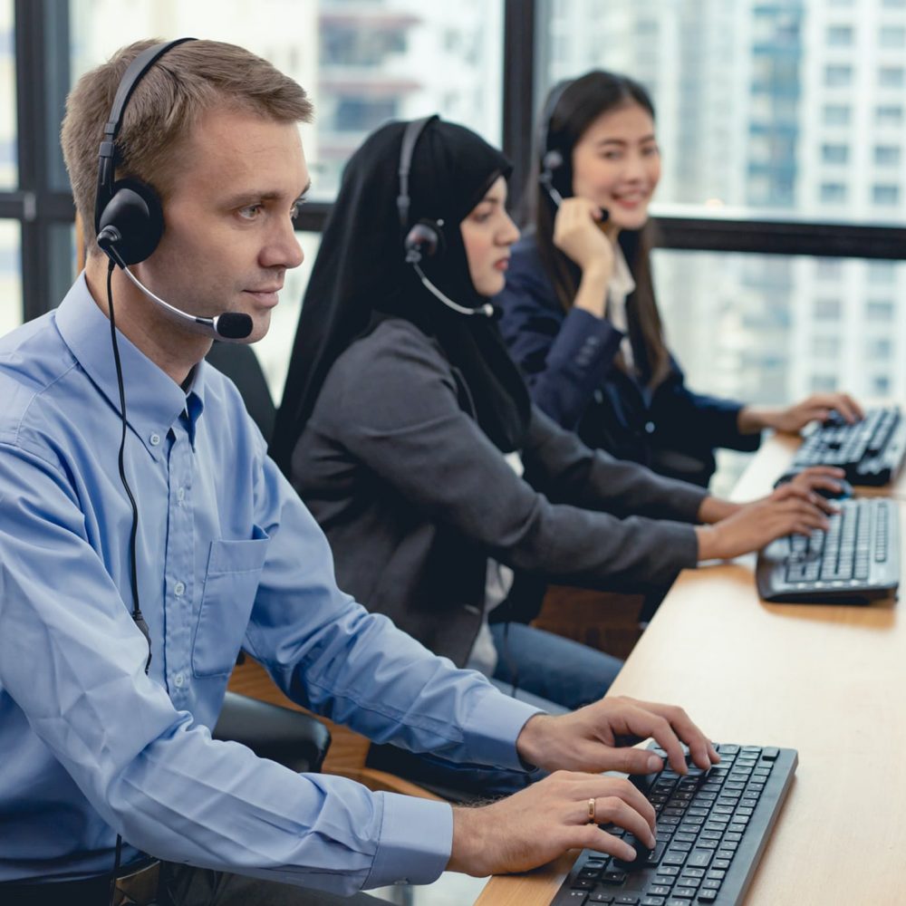 group-of-diverse-telemarketing-customer-service-staff-team-in-call-center- (1)-min group-of-diverse-telemarketing-customer-service-staff-team-in-call-center- (1)-min